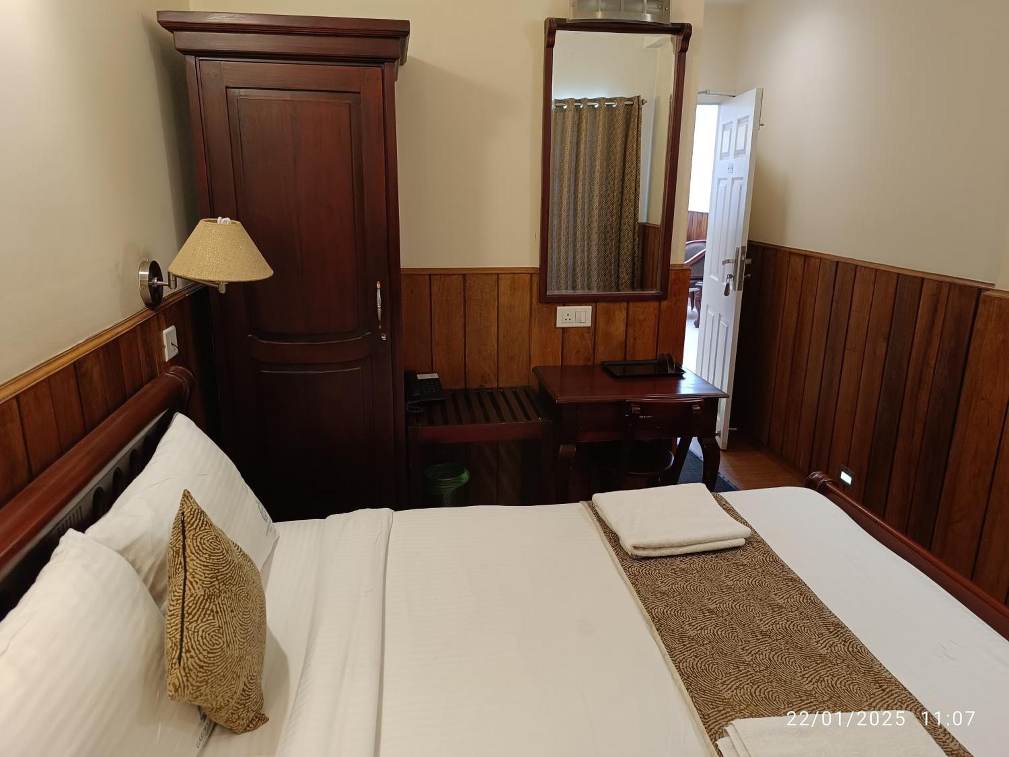 Готель Garden Manor Уті Номер фото